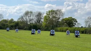 Archery targets set out in a green field